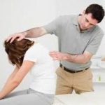Chiropractor checking