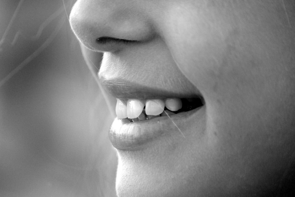 partial shot of a smiling girl